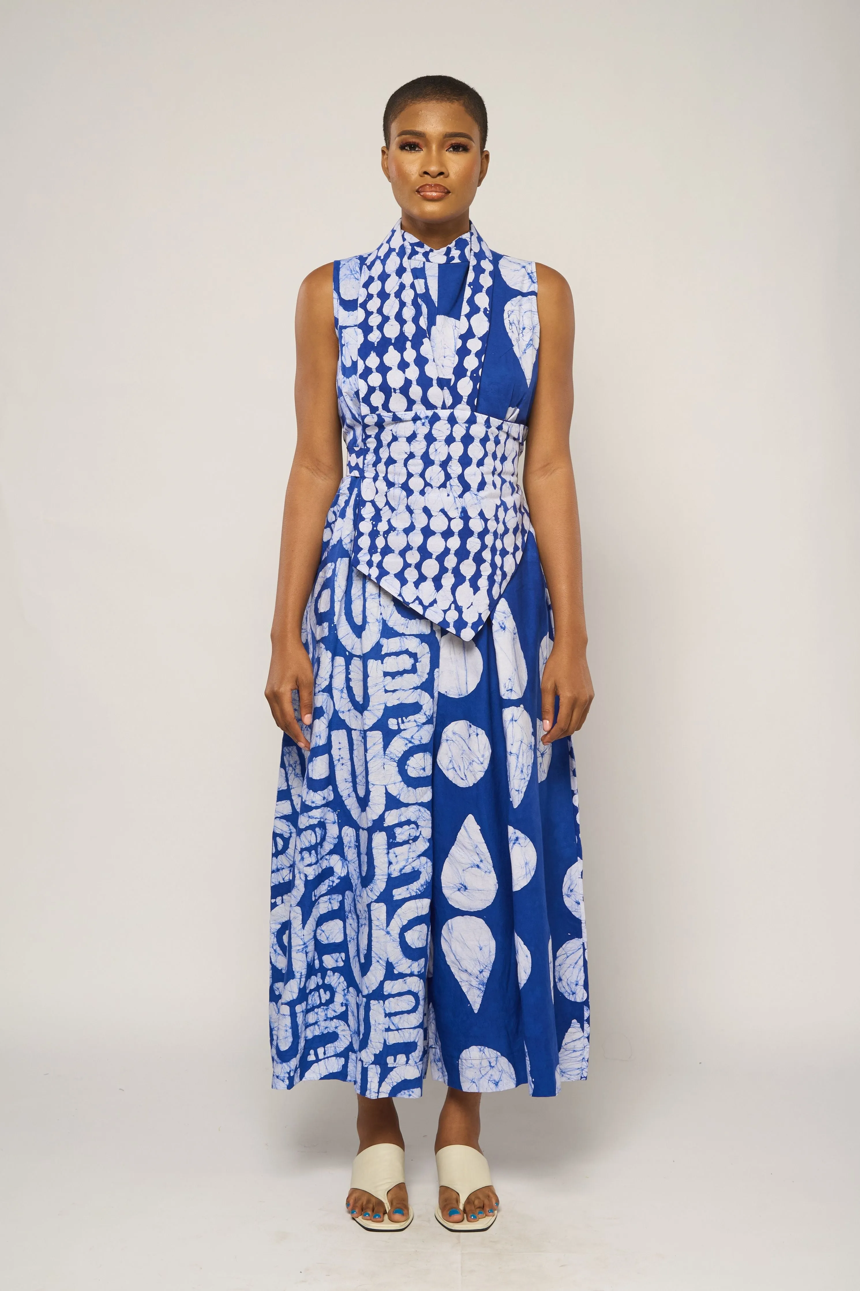 BLUE MULTIPRINT JUMPSUIT WITH BIB