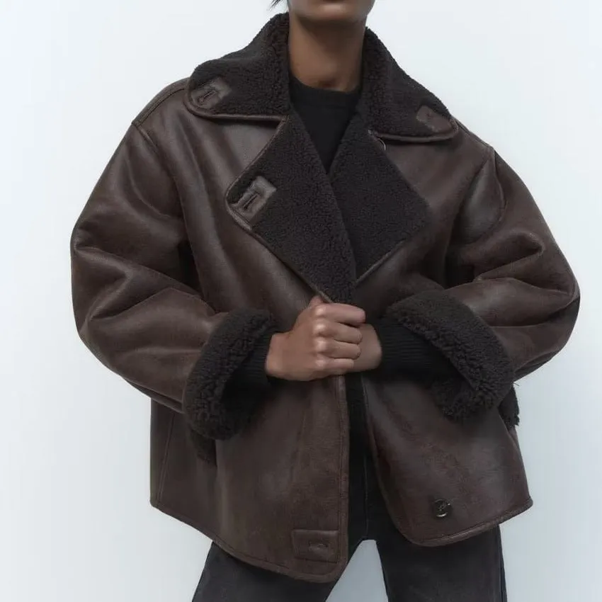 Coat in synthetic shearling and leather